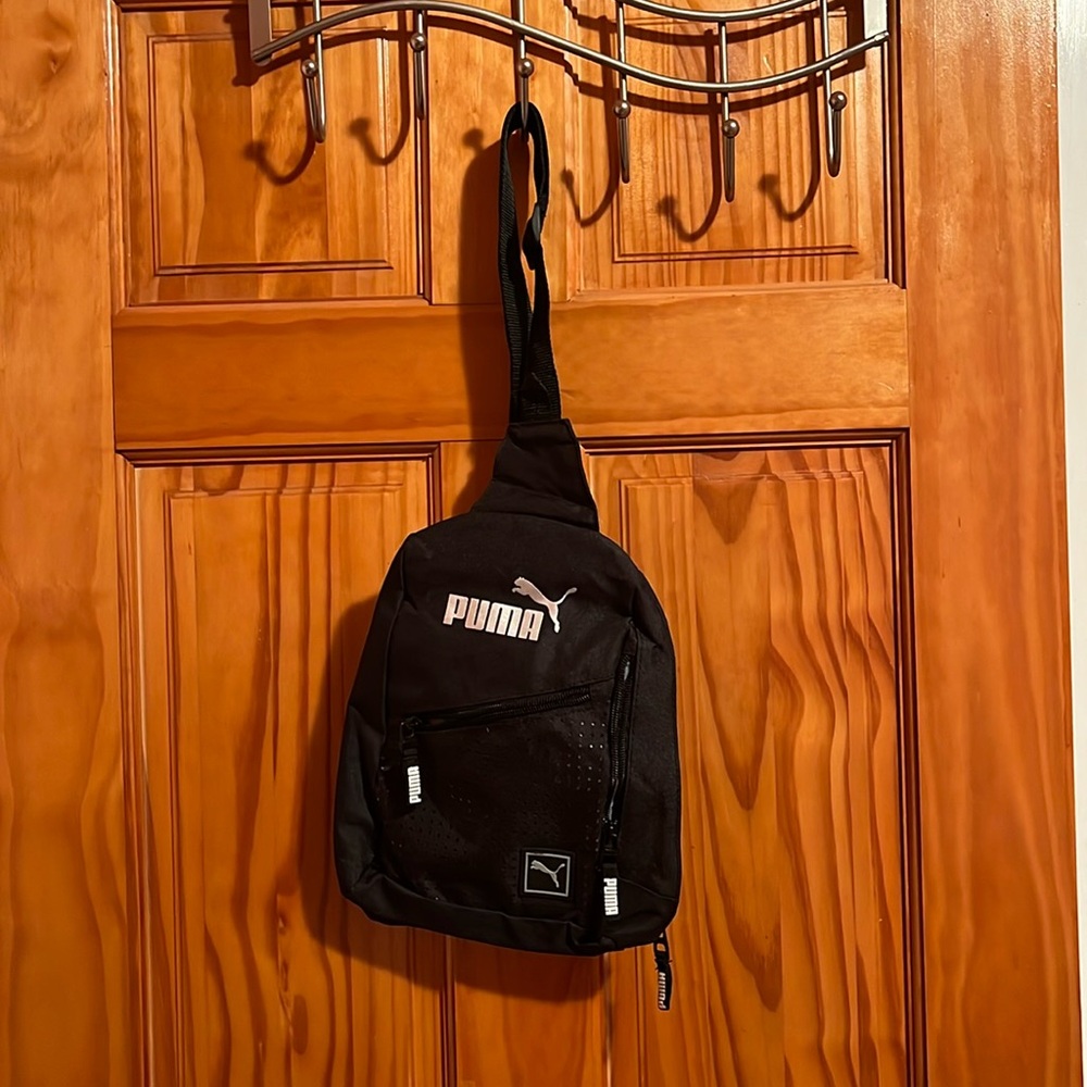 Puma crossbody bag.
3 different compartments